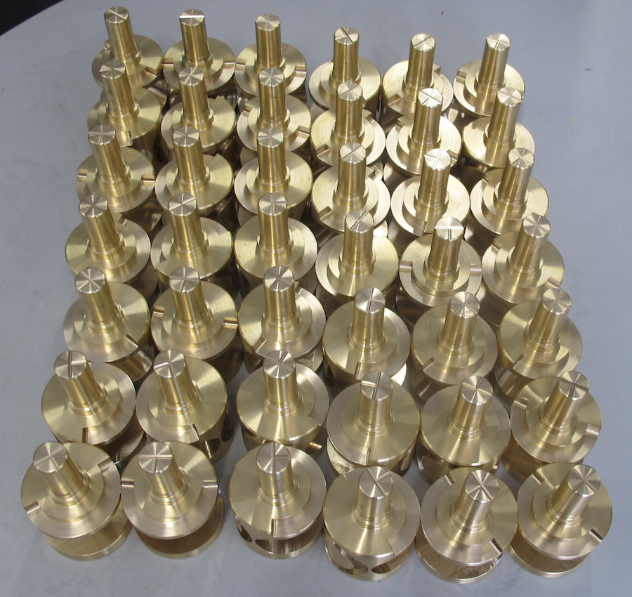 A batch of brass sockets milled by our engineers