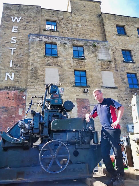 Ryan Ainley outside Westin Engineering with the Sunderland gear generating machine